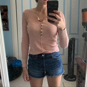 Long-sleeved, pink Henley shirt